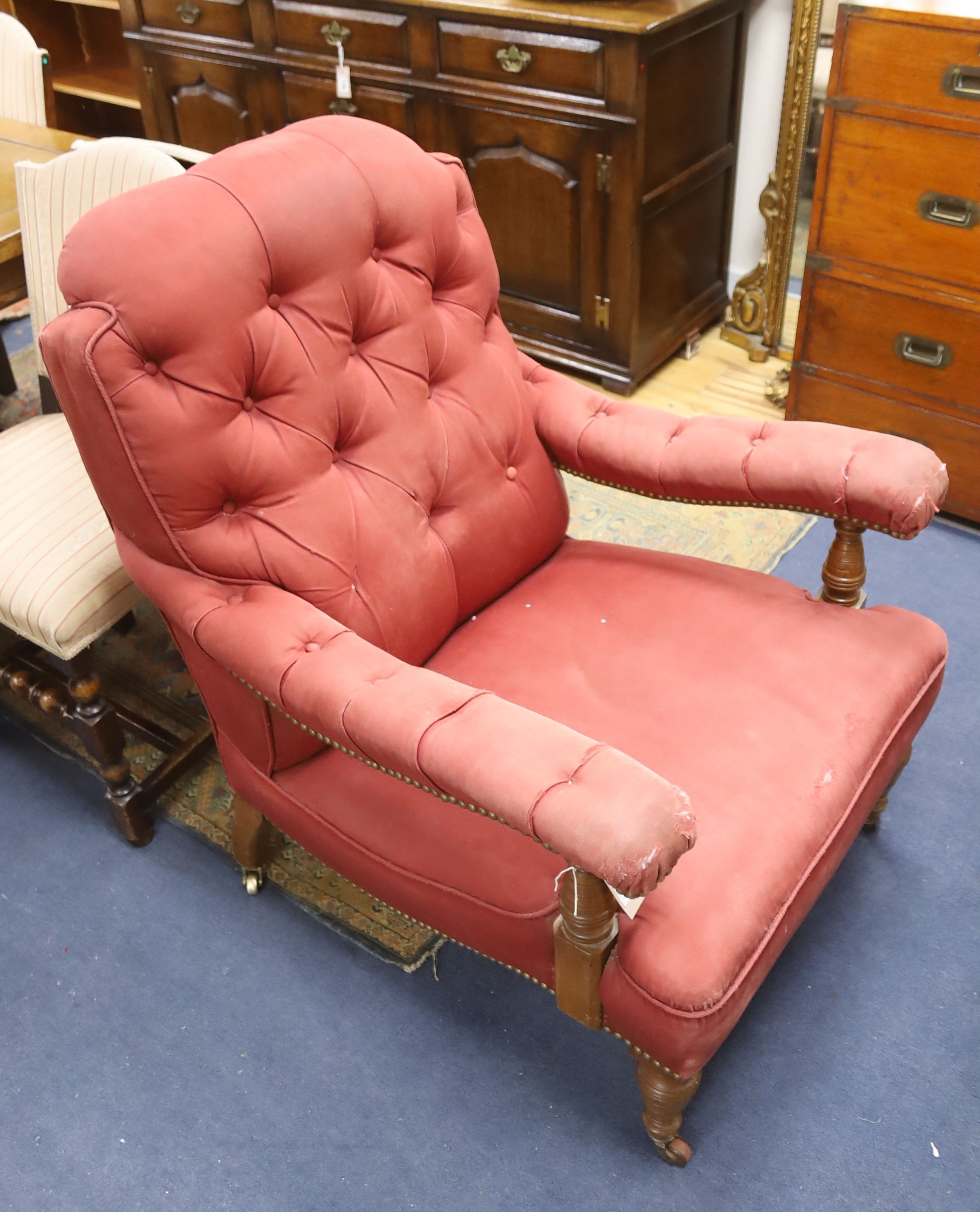 A Victorian oak upholstered open armchair, width 74cm, depth 84cm, height 98cm